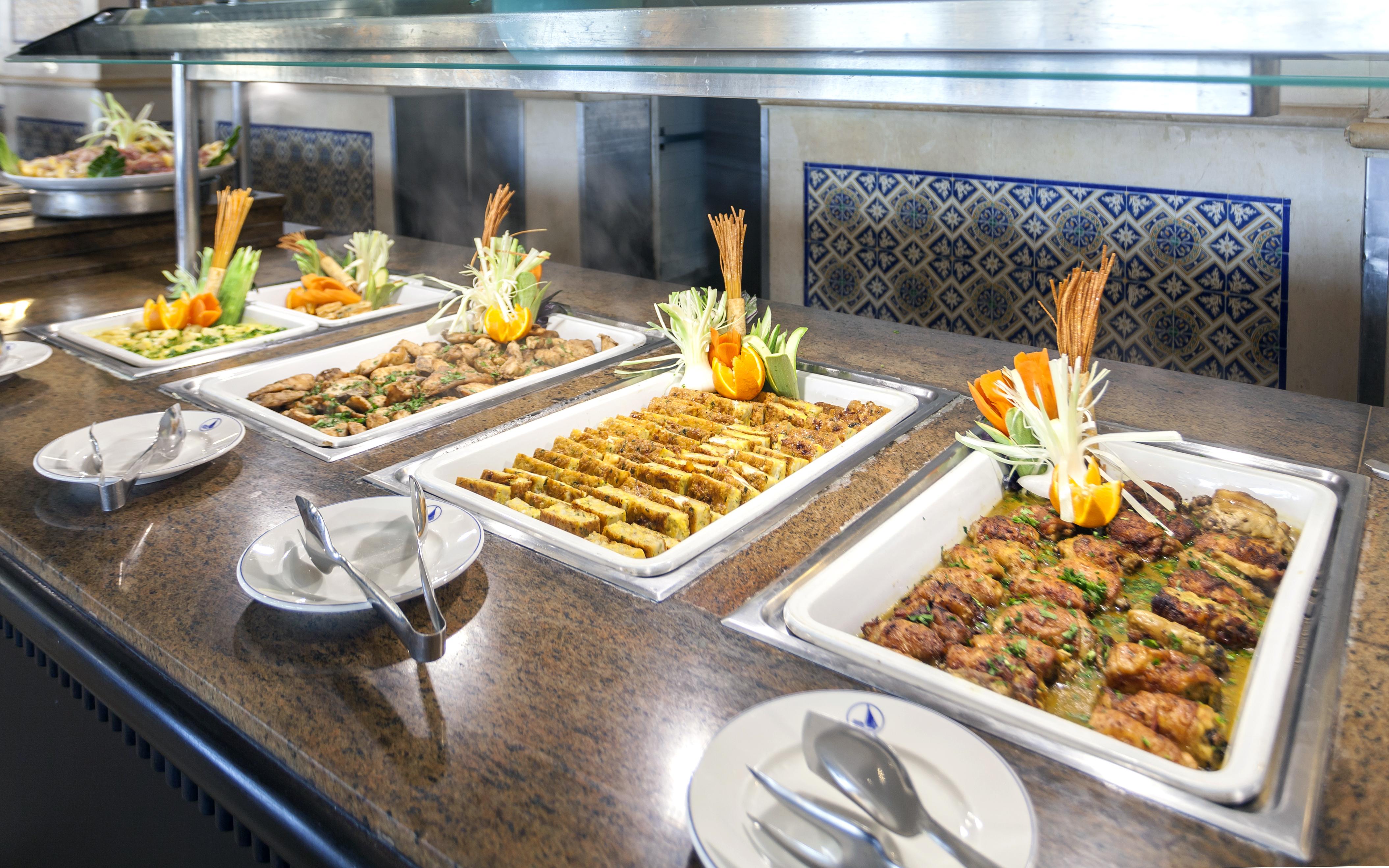 Готель El Mouradi Камарт Екстер'єр фото Buffet at a hotel